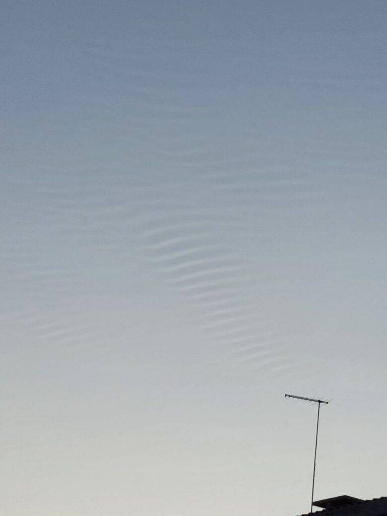 Image of clouds conforming to frequencies input into the atmosphere